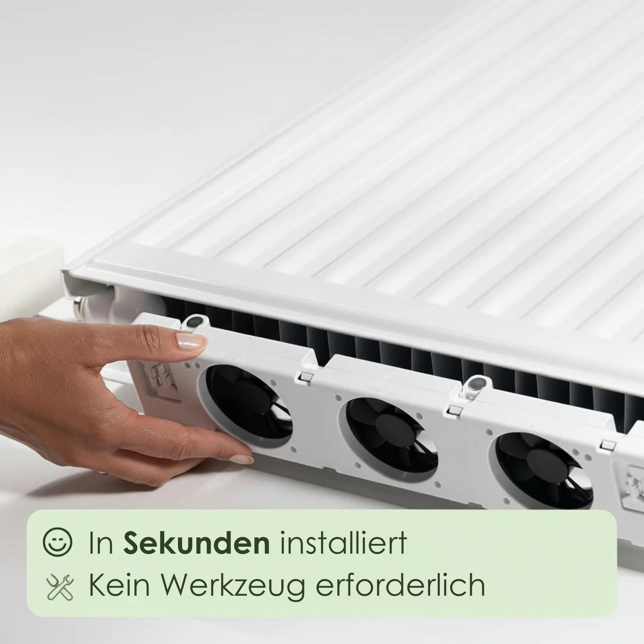 Hand installing a white radiator cover with text indicating quick installation and tool-free setup.